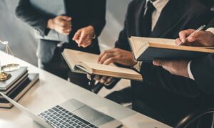 18 wheeler accident attorney team researching legal info