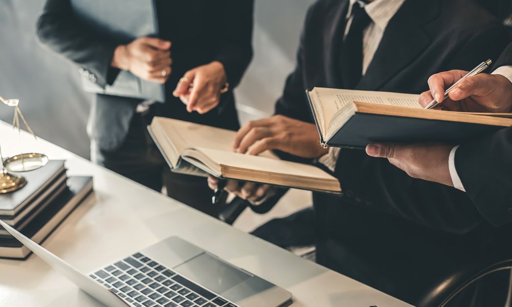 18 wheeler accident attorney team researching legal info